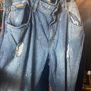 Distressed Blue Denim Jeans